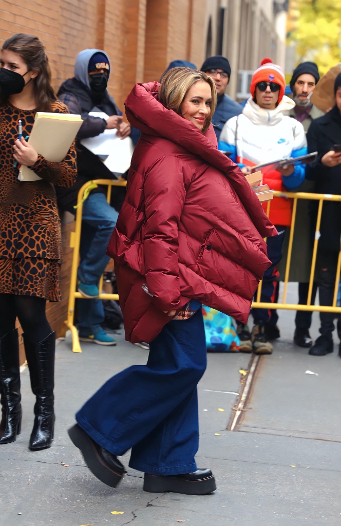 alyssa milano, nyc, red puffer coat, baggy jeans, black platform boots