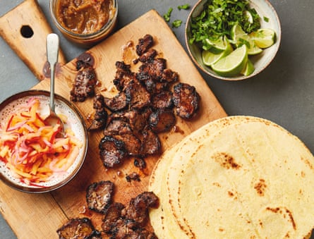 Yotam Ottolenghi’s barbecue lamb tacos with pineapple pickle and chutney.