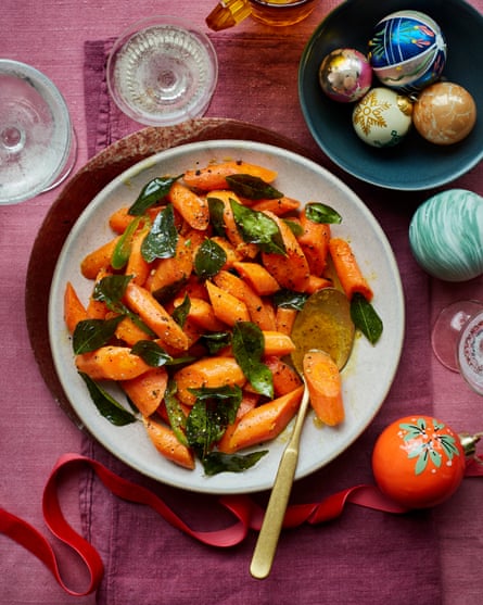 Yotam Ottolenghi’s turmeric ghee-braised carrots with crisp curry leaves.