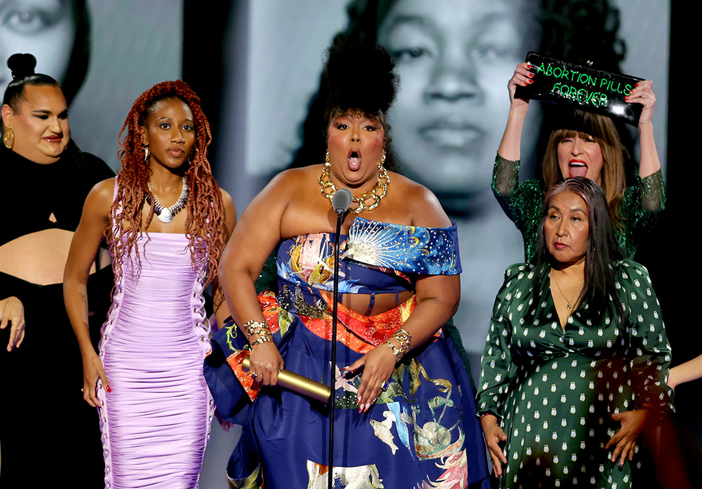 Jayla Rose Sullivan, Kara Roselle Smith, Lizzo, Odilia Romero and Amelia Bonow on stage during the 2022 People's Choice Awards held at the Barker Hangar on Dec. 6, 2022 in Santa Monica, California. 