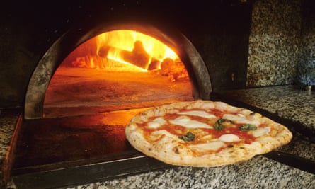 a margherita coming out of the oven at Cafasso