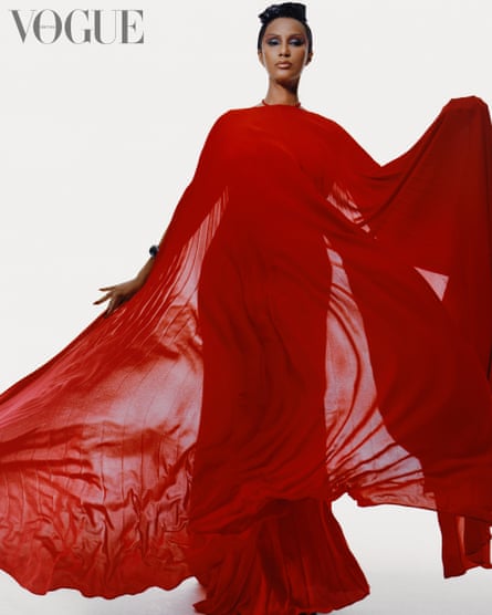 Iman in flowing red dress