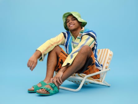 Jamoo jumper and shorts; Lucy Folk hat; Birkenstock sandals; Sunday Supply Co. beach chair.