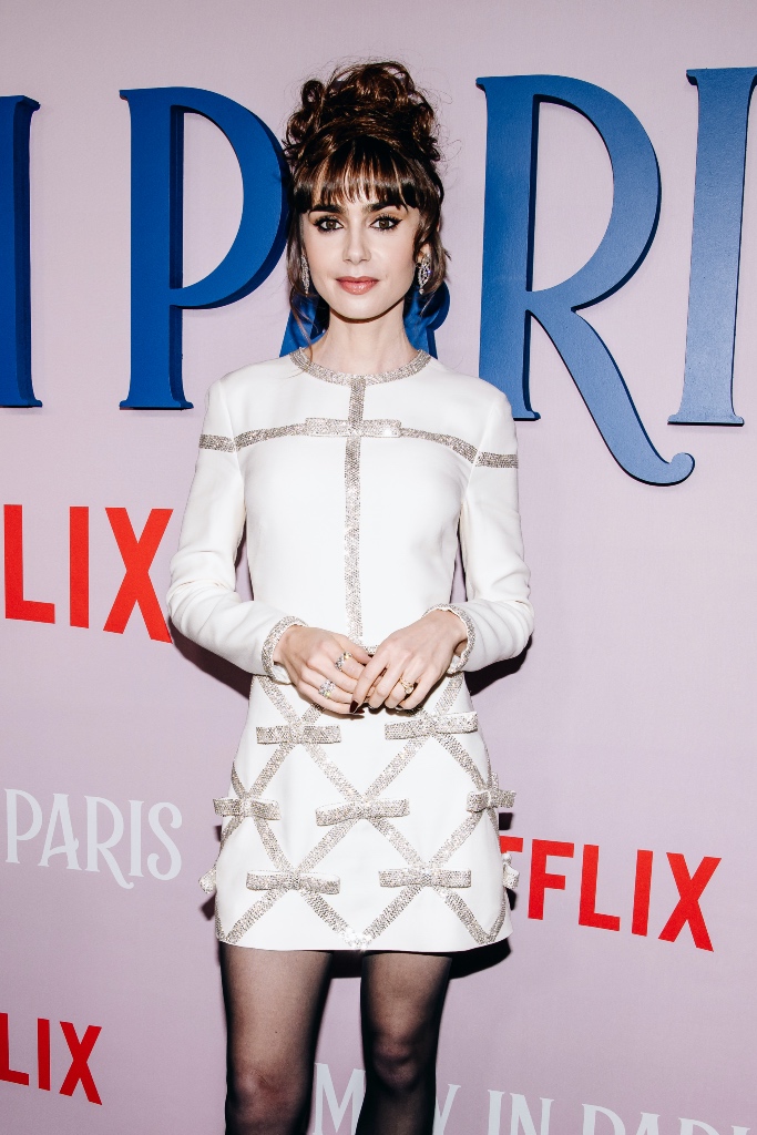 lily collins, nyc, emily in paris, plaforms, sparkle, bow, white mini dress, long sleeves, tights, red carpet