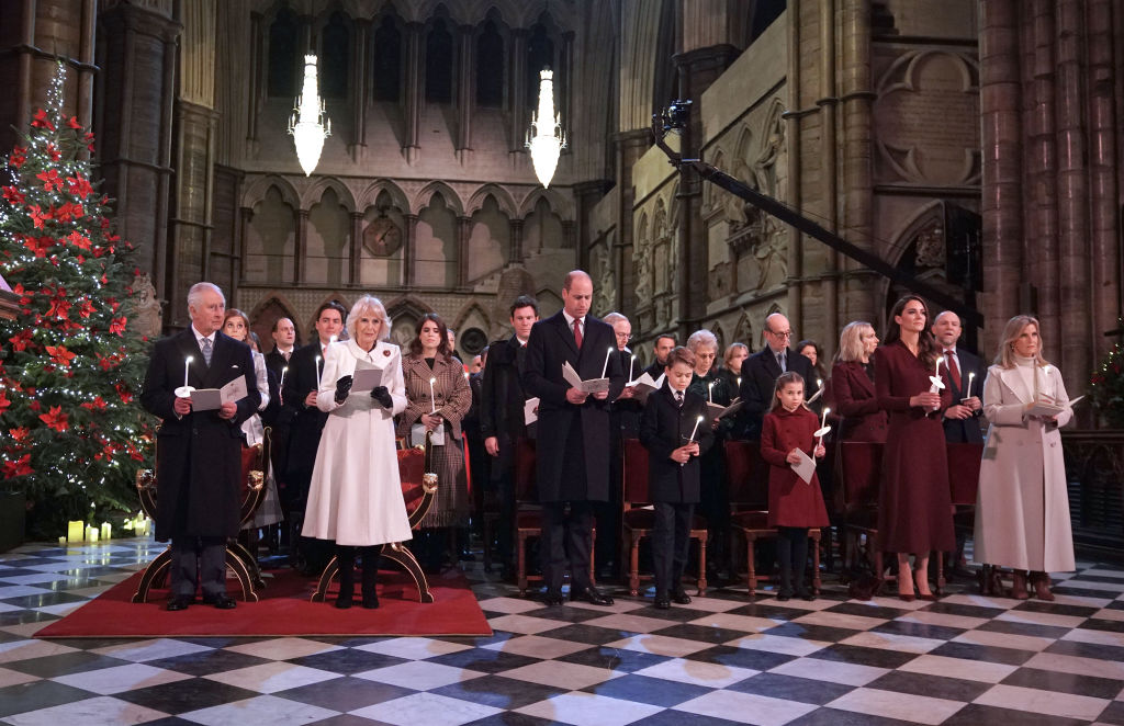 LONDON, ENGLAND - DECEMBER 15: (Front row left to right) King Charles III, Camilla, Queen Consort, Prince William, Prince of Wales, Prince George, Princess Charlotte, Catherine, Princess of Wales and Sophie, Countess of Wessex during the 'Together at Christmas' Carol Service at Westminster Abbey on December 15, 2022 in London, England. The service will be broadcast on ITV1 on Christmas Eve as part of a Royal Carols: Together At Christmas programme, narrated by Catherine Zeta Jones and featuring an introduction by Kate and tributes to Queen Elizabeth II. (Photo by Yui Mok - Pool/Getty Images)