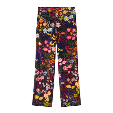 Dark trousers with bright flowers