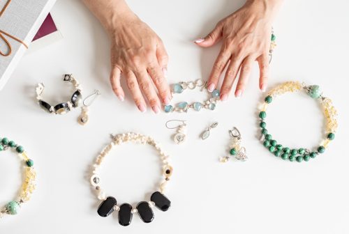 older woman selecting jewelry