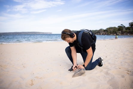 Jacob Robbins and Emma Lake, Detecting at Balmoral beach in front of Bathers Pavillion, Sydney, NSW, Australia. Jacob and Emma have become avid treasure hunters using metal detectors to uncover buried secrets. They have found pennies, florins and even roman coins in their escapades. A DAY AT THE BEACH.