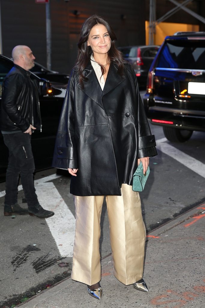 Katie Holmes arrives at Good Morning America in tan pants and leather jacket in New York on Jan. 10, 2023.