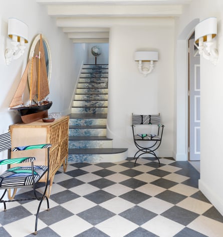 The traditional blue and white chequerboard stone floor in the entry hall.