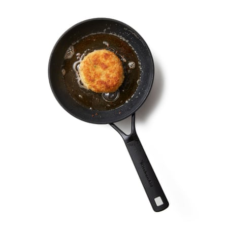 Put the butter and oil in a frying pan on a medium-high heat and, once it’s hot and the foam has subsided, lay in the fishcakes, in batches if the pan is small, and cook for five minutes until golden and well crusted underneath. Carefully flip it over, repeat on the other side, then eat immediately.