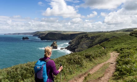 Walker on the South West Coast Path near Boscastle.