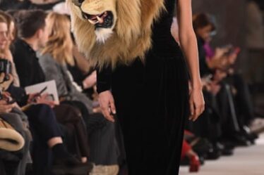 Russian model Irina Shayk walks the runway in the lion dress at the Schiaparelli show.