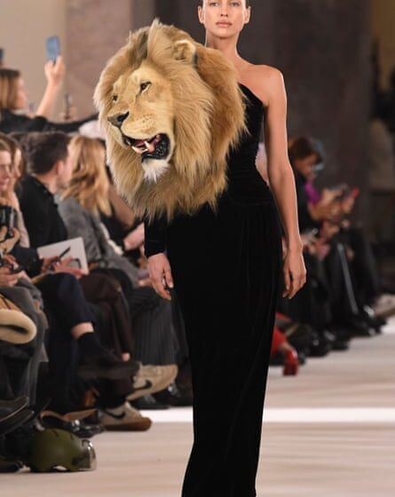 Russian model Irina Shayk walks the runway in the lion dress at the Schiaparelli show.