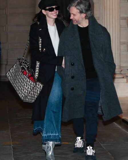 Anne Hathaway and her husband Adam Shulman are seen leaving Valentino fittings during Paris Fashion Week on Jan. 24th, 2023.