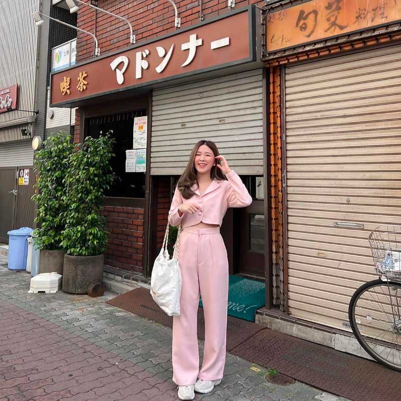 A Petite Women Wearing Pink Outfit