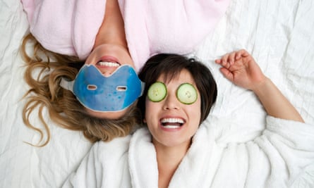 Women in bathrobes wearing eye masksGettyImages-138300747