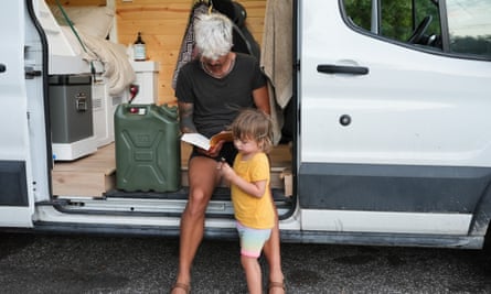 man and child in van
