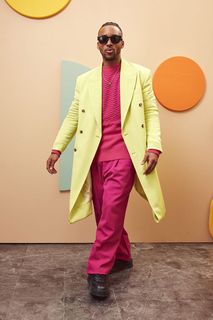 Algee Smith Wore Versace To The 'Roots To Rise' Market Event