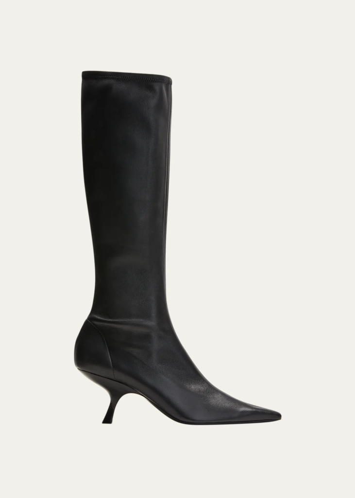 Knee high black leather boots from The Row.