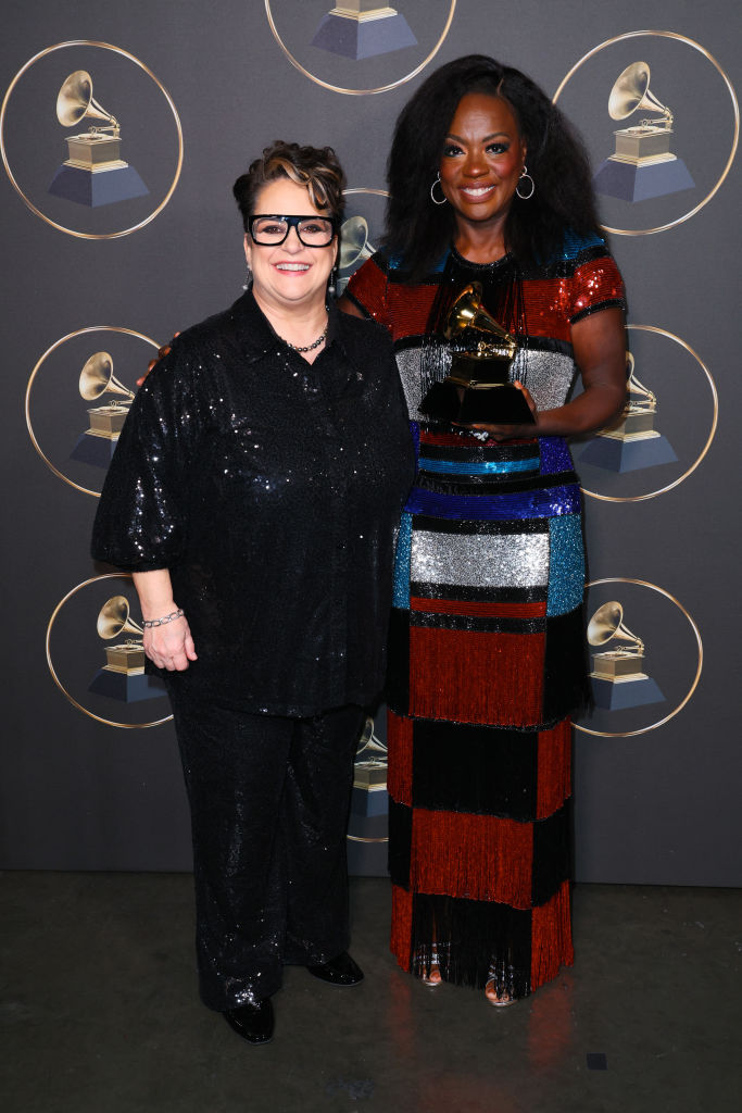 LOS ANGELES, CALIFORNIA - FEBRUARY 05: Recording Academy Chair of the Board of Trustees Tammy Hurt congratulates Viola Davis with the Best Audio Book, Narration, and Storytelling award for 