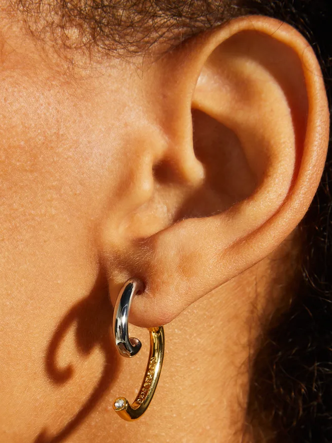 2023 Jewelry Trends: Silver and gold earrrings