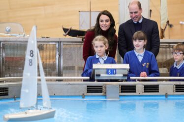 Britain's Catherine Princess of Wales  and Britain's Prince William Prince of Wales smile with local school children as...