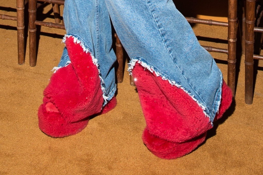 Lil Nas X, jeans, blue jeans, red jeans, slides, platforms, platform slides, red slides, Tabby, Tabby handbag, Coach, NYFW, New York Fashion Week, fall 2023, fashion show, front row