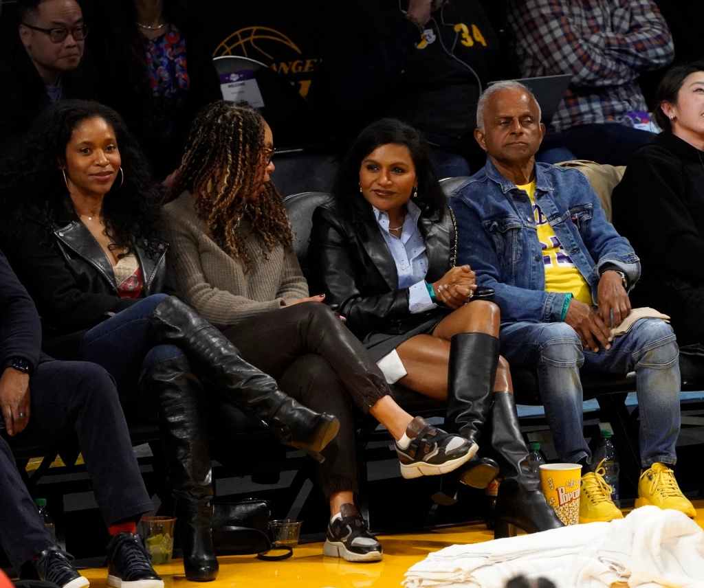 Mindy Kaling and her dad attend a basketball game between the Los Angeles Lakers and the Golden State Warriors at Crypto.com Arena.Pictured: Merrin Dungey,Channing Dungey and Mindy Kaling Ref: SPL5525080 230223 NON-EXCLUSIVE Picture by: London Entertainment / SplashNews.com Splash News and Pictures USA: +1 310-525-5808 London: +44 (0)20 8126 1009 Berlin: +49 175 3764 166 photodesk@splashnews.com World Rights