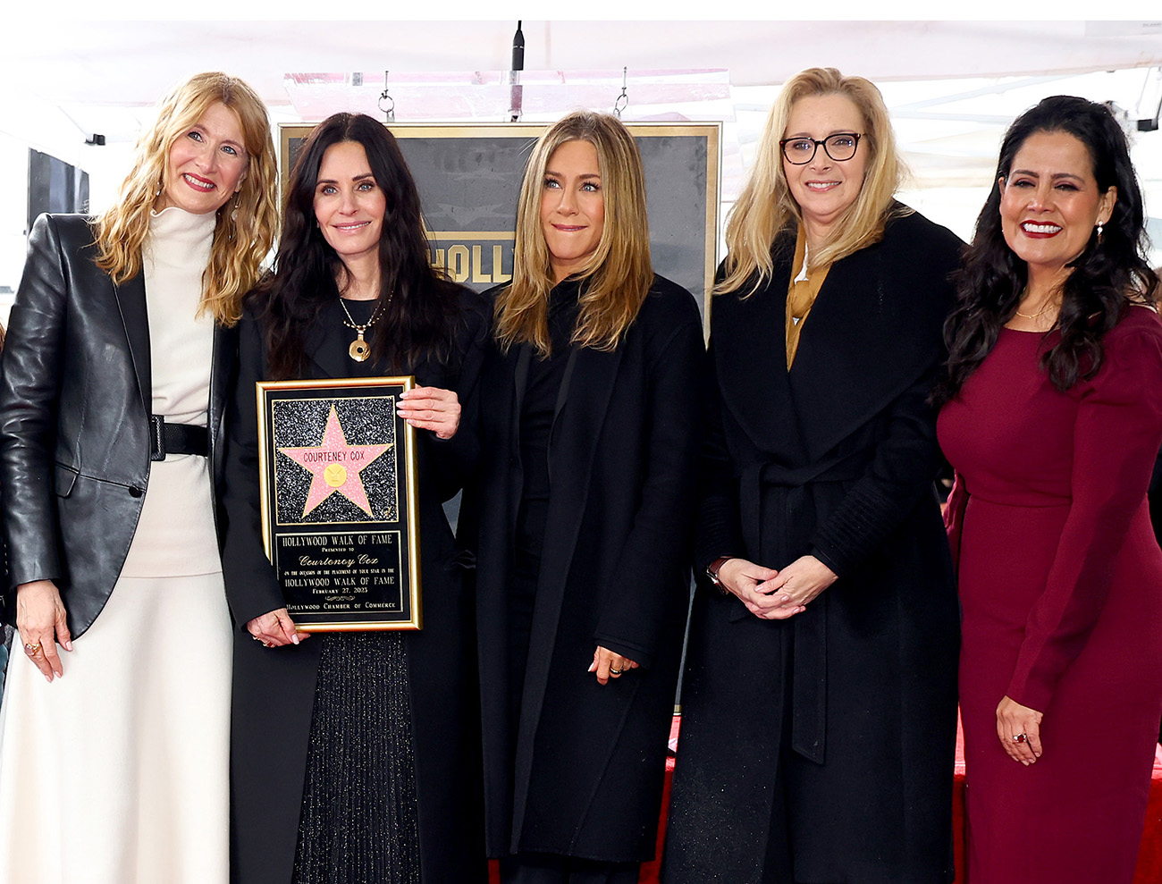HOLLYWOOD, CALIFORNIA - FEBRUARY 27: (L-R) Laura Dern, Courtney Cox, Jennifer Aniston, Lisa Kudrow and Lupita Sanchez Cornejo, Hollywood Chamber of Commerce Chair attend the Hollywood Walk of Fame Star Ceremony for Courteney Cox on February 27, 2023 in Hollywood, California. (Photo by Leon Bennett/Getty Images)