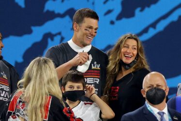 TAMPA FLORIDA  FEBRUARY 07 Tom Brady 12 of the Tampa Bay Buccaneers celebrates with Gisele Bundchen after winning Super...