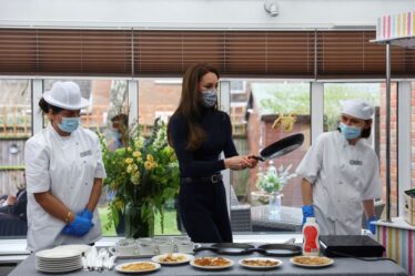 Kate Middleton prepares pancakes during a visit of the Oxford House nursing home in Slough, Eng. on Feb. 21, 2023.