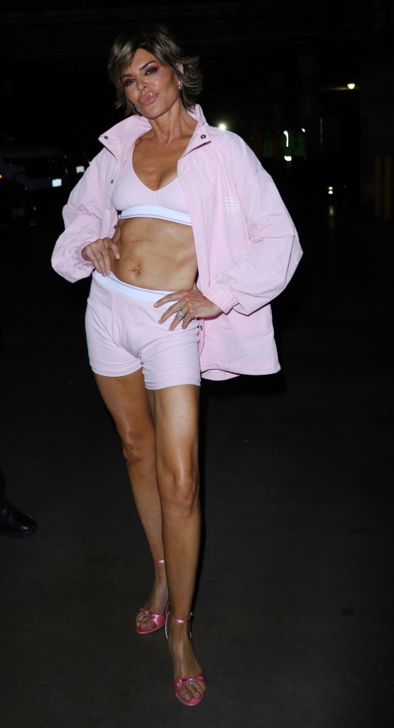 Lisa Rinna flaunts her abs and stops security in their tracks as she leaves Crypto.com arena in Los Angeles on Feb. 7th, 2023.