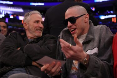 Jon Stewart and Pete Davidson attend the game between the New York Knicks and the Los Angeles Lakers at Madison Square...