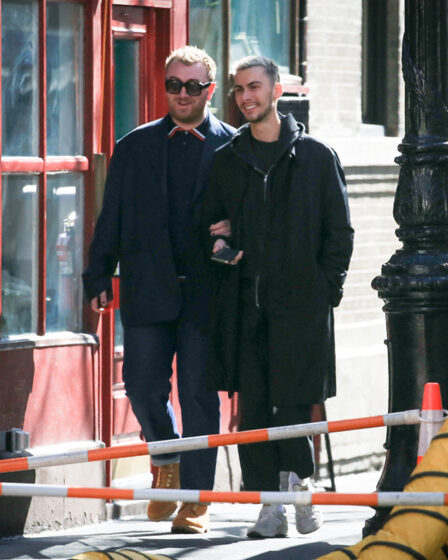Sam Smith with Christian Cowan heading to a restaurant in New York on Feb. 15, 2023.