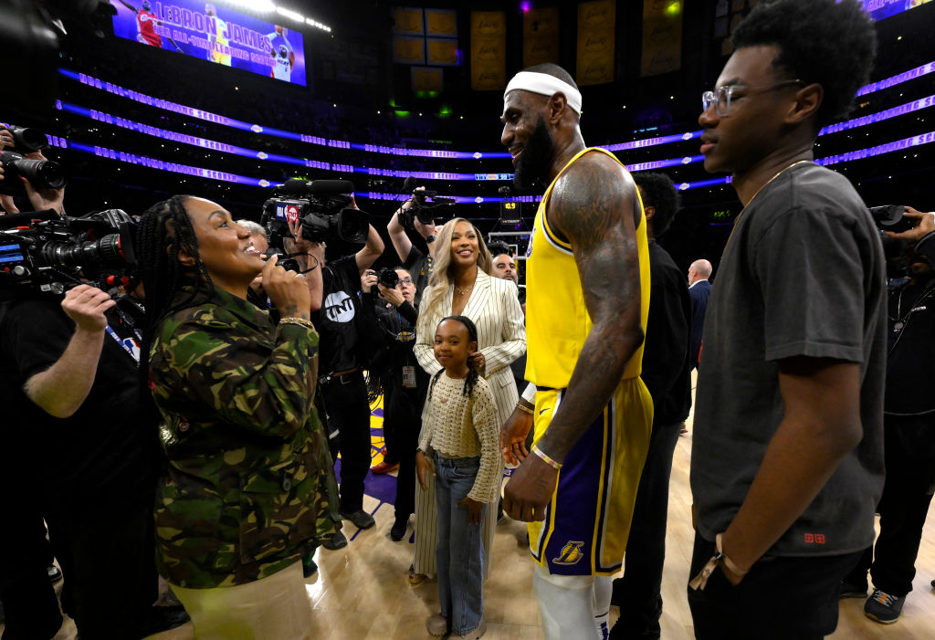 Los Angeles, CA - February 07: LeBron James #6 of the Los Angeles Lakers celebrates with his mom Gloria James, left, and wife Savannah James, center, and daughter Zhuri James along with son Byrce James, right, after breaking Hall of Fame and former Los Angeles Lakers Kareem Abdul Jabbar scoring record (38,387) in the second half of a NBA basketball game against Oklahoma City Thunder at the Crypto.com Arena in Los Angeles on Tuesday, February 7, 2023. (Photo by Keith Birmingham/MediaNews Group/Pasadena Star-News via Getty Images)
