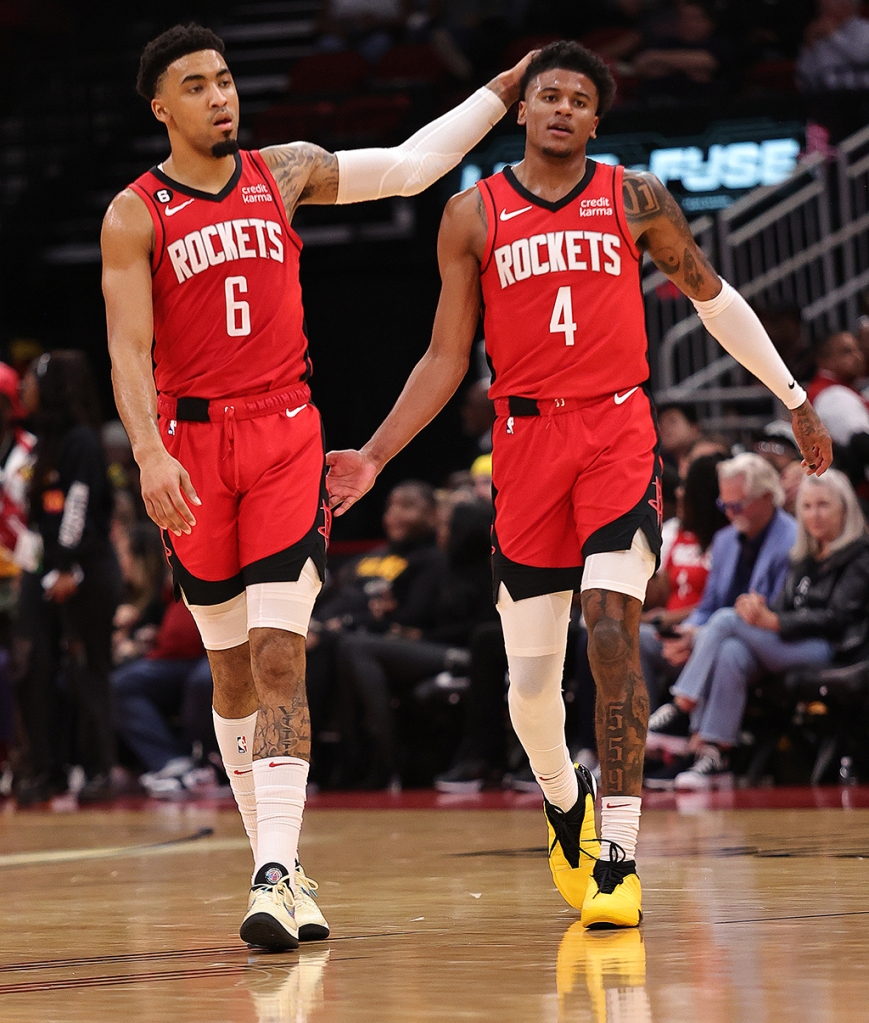 Kenyon Martin Jr. #6 and Jalen Green #4 against the Denver Nuggets react in the second half at Toyota Center on Feb. 28, 2023 in Houston.