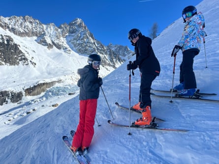 The writer’s eldest son and two of his friends stand on a slope at the Glacier d'Argentiere, France.