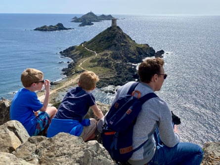 The writer’s family looking out to sea from Pointe de la Parata.