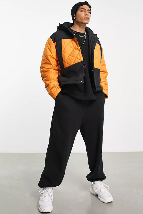  oversized quilted rain jacket with hood in orange and black