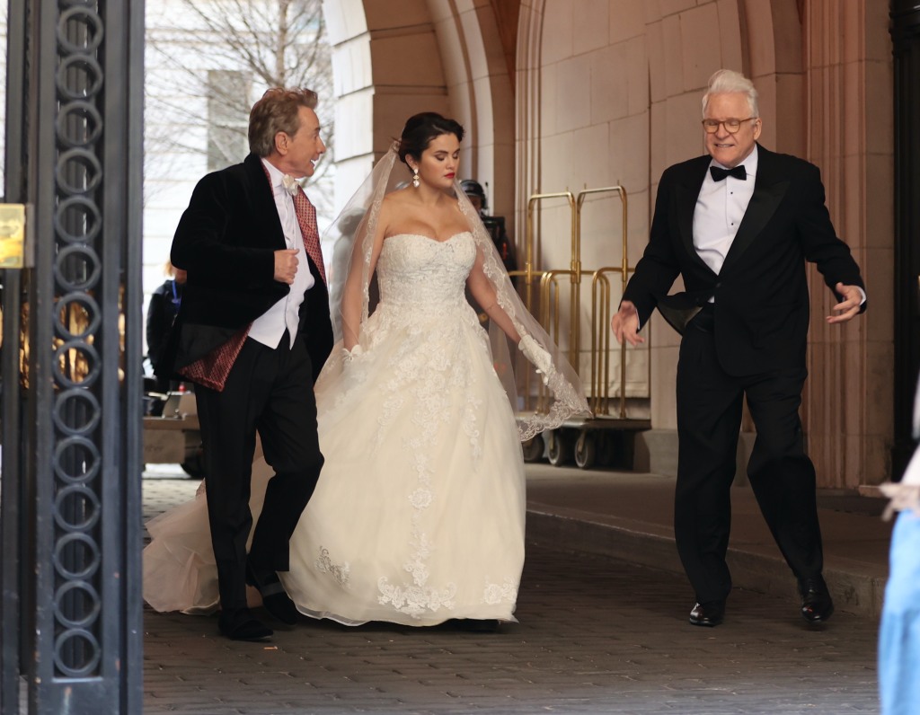 Selena Gomez spotted wearing a wedding a wedding dress at the “Murders in the Building” set in Uptown, Manhattan.Pictured: Selena Gomez,Steve Martin and Martin Short Ref: SPL5531816 210323 NON-EXCLUSIVE Picture by: Jose Perez / SplashNews.com Splash News and Pictures USA: +1 310-525-5808 London: +44 (0)20 8126 1009 Berlin: +49 175 3764 166 photodesk@splashnews.com World Rights