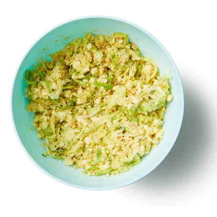 Strip off the leaves from the thyme sprigs, then finely chop them and put in a large bowl with 100g of the breadcrumbs. Stir in the cheese and leeks then add the egg yolk, milk and mustard mix to the bowl, too.