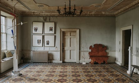 A quartet of framed works in the huge entrance hall, with tiled patterned floor.