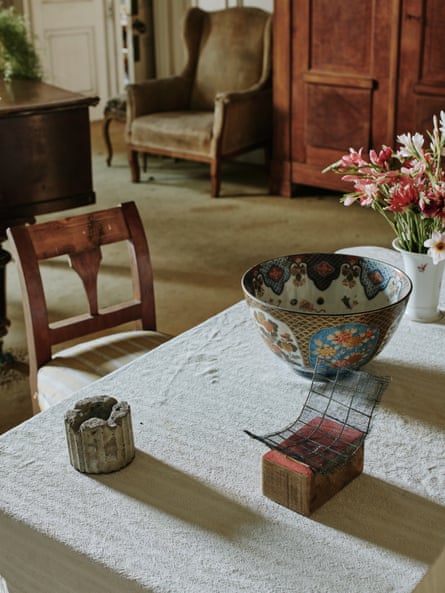 A table with rustic objects on it.
