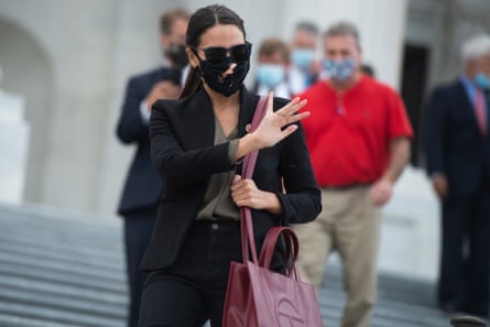 Alexandria Ocasio-Cortez leaves the Capitol toting a Telfar bag.