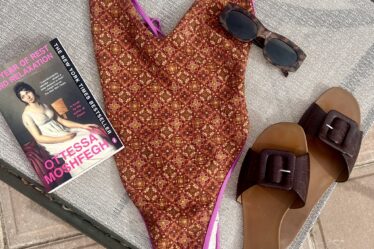 woman wearing FB Beach Amber One-Piece Swimsuit