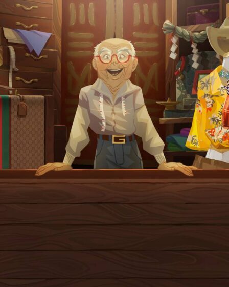 A cartoon version of an older gentelman stands in what looks like a tailor shop surrounded by Gucci clothing and accessories.