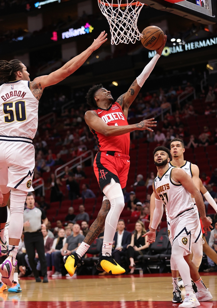 Jalen Green #4 of the Houston Rockets drives to the basket on Aaron Gordon #50 of the Denver Nuggets during the first quarter at Toyota Center on Feb. 28, 2023 in Houston.
