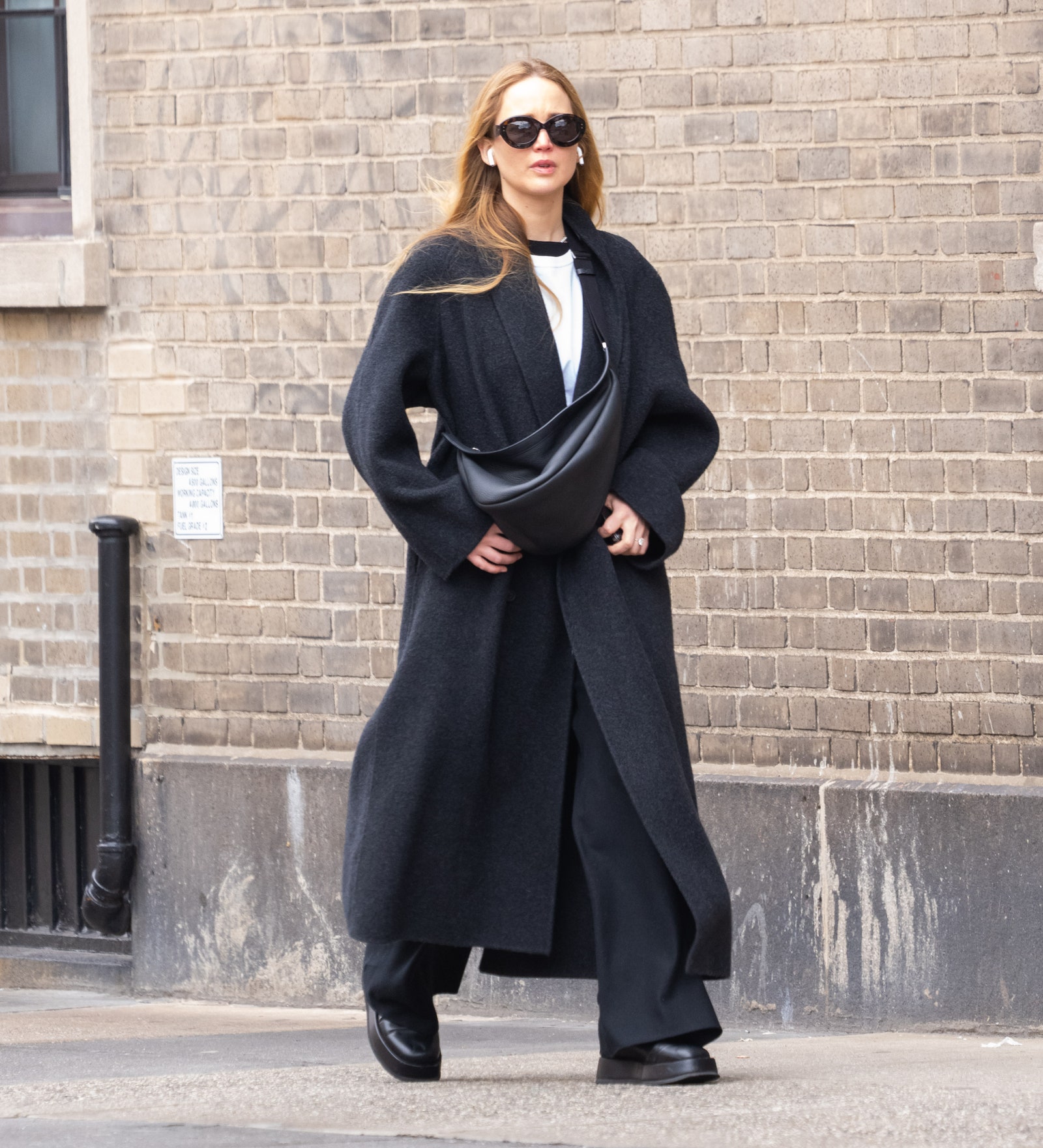 Jennifer Lawrence Wore Chunky Black Boots Oversize Coat