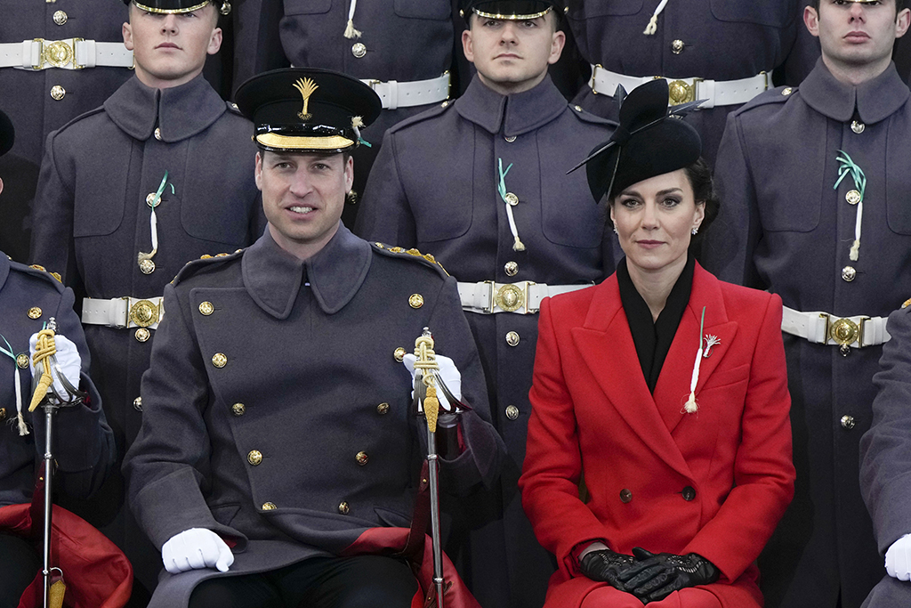 Prince William, Prince of Wales and Catherine, Princess of Wales sit for an official photo with The Prince of Wales's company during a visit to the 1st Battalion Welsh Guards at Combermere Barracks for the St David’s Day Parade on March 1, 2023 in Windsor, Eng.